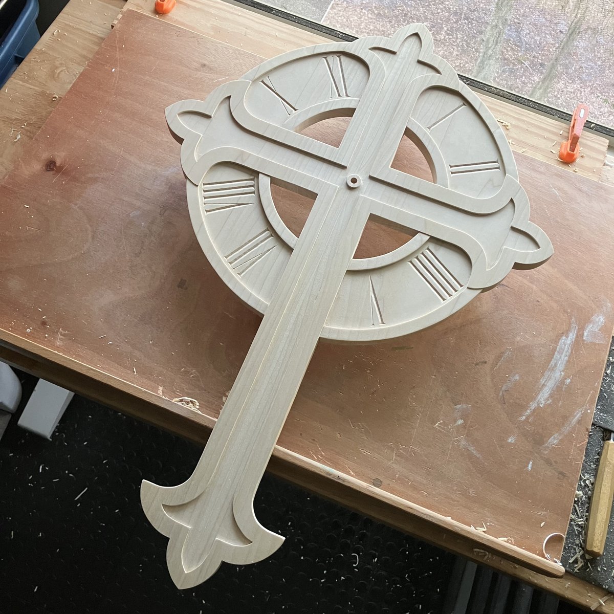 BlakeAShattuck's tweet image. Working on this large clock!  Hand carved in poplar - 19 x 28 inches.  Features a large Cross. #clock #woodcarving