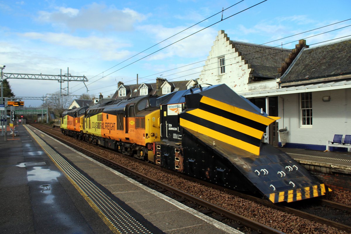 Colas liveried 37175+37057 pass through Dunblane as they push an  independent snowplough southwards with 7Z37 Inverness Millburn - Larbert  CE move. The plough would later be moved south to Eastriggs for storage  13.4.26 scottishtrains.zenfolio.com/p604331348/e54…