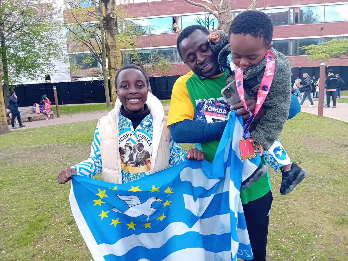 KFombat's tweet photo. #ManchesterMarathon2026 it was another opportunity to showcase the colours of #Ambazonia in today's 26.2 miles challenge. @realDonaldTrump deals with Paul  Biya won't stop us. #Ambazonia's Freedom cannot be Compromised @10DowningStreet @TiborPNagyJr @CNN @Pontifex @PolitlcsUK https://t.co/1xP1bYTFVH