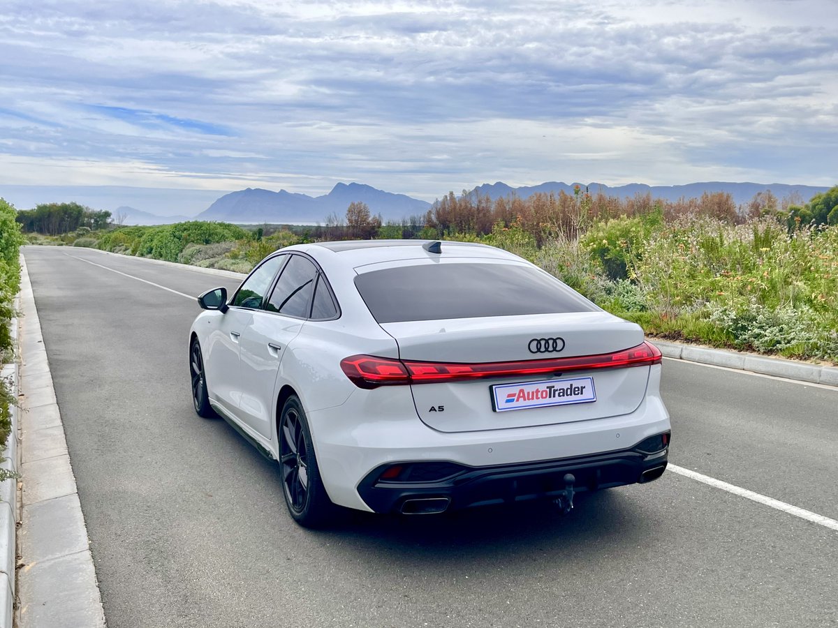 AutoTraderSA's tweet photo. The @audisouthafrica #A5 Sedan Black Edition: a luxury road-tripper with a ChatGPT-enhanced cabin, stellar sound, and a dedicated "passenger princess" screen 👑 

At R1,165,800, it’s a tech-heavy deal—until you hit the options list. 📉 Would you dare to drive a sedan? https://t.co/GtiRNYIUdW