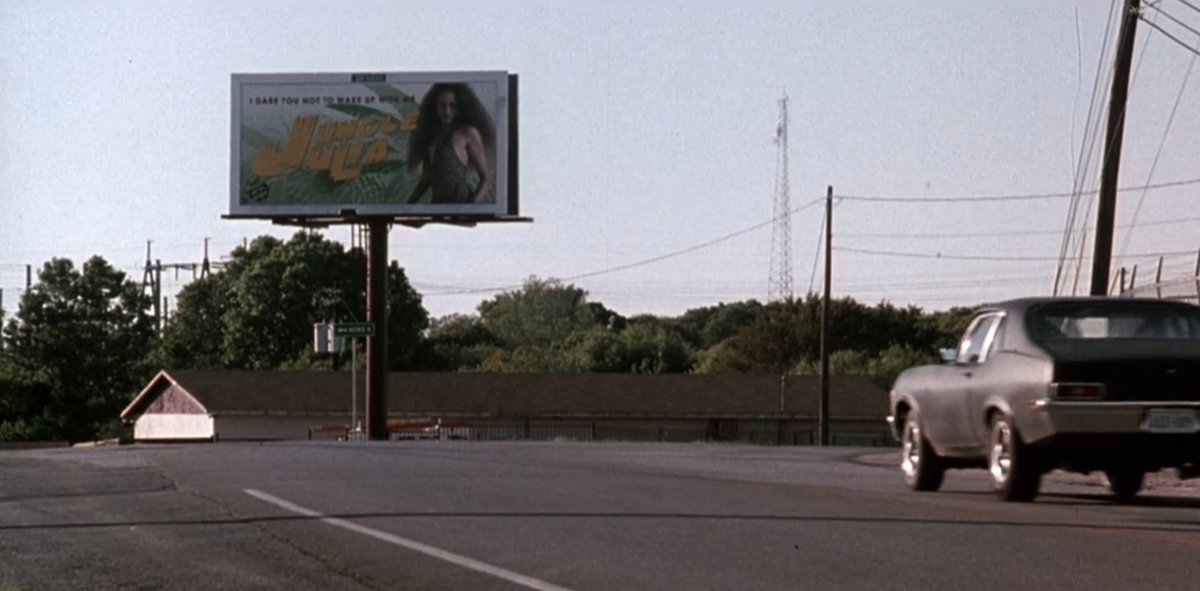 NINETIESWITCH's tweet photo. Sydney Poitier's Jungle Julia billboards in 'Death Proof' (2007) https://t.co/FDUBdd4fac
