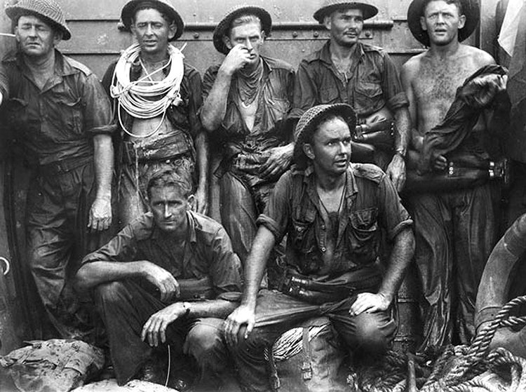 WWIIpix's tweet image. Australian engineers from the 2/13 Field Company rest after clearing Japanese beach defences on Tarakan Island, April 1945.

Relief, exhaustion, or something else. What stands out to you first in this image? #WW2