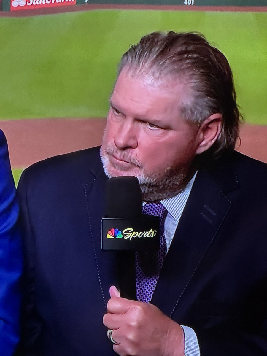 John Kruk in a suit looks like someone who’s been advised by a judge to not represent themself in court.