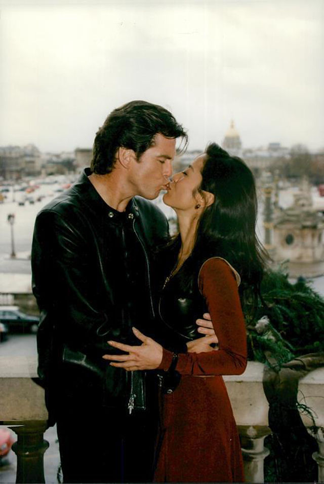 Pierce Brosnan and Michelle Yeoh at a press event for Tomorrow Never Dies held at the Hôtel de Crillon, Paris, France on the 11th of December 1997