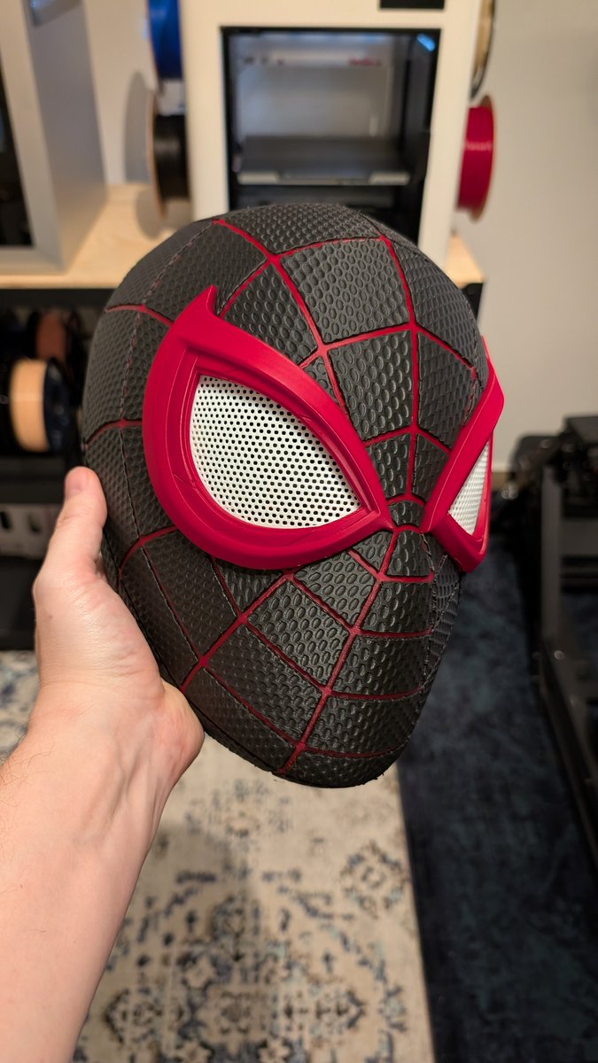 snapmaker's tweet image. Mask on. Hero mode activated. 🕷️🖤
Miles Morales PS5 textured helmet, brought to life with 3D printing. Clean lines. Sharp details. Ready for action. ⚡🕸️

Printer: Snapmaker U1
Printed by: Alex Gittfried
Model by: Budwin3d (MakerWorld)

#SnapmakerU1 #3DPrinting #Cosplay
