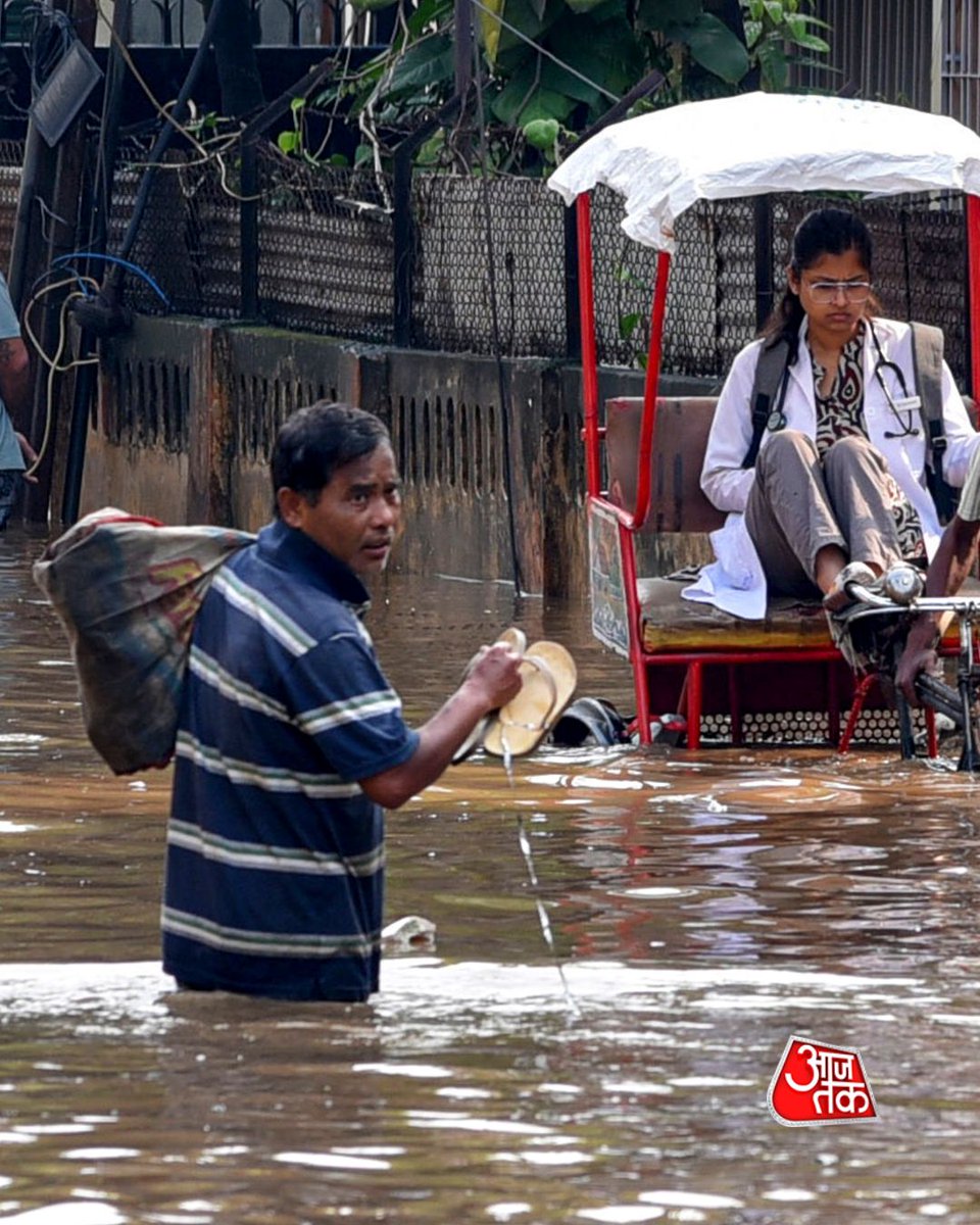 aajtak's tweet image. गुवाहाटी में बारिश के बाद पानी से भरी सड़कों के बीच रोज़मर्रा की ज़िंदगी का सफर जारी

#Guwahati #Assam #Rainfall #Waterlogging
#Monsoon #HeavyRain #ATPhotoBlog #AajTakSocial

[Guwahati rain, Assam waterlogging, heavy rainfall India, urban flooding Guwahati, Rajgarh area flooding,