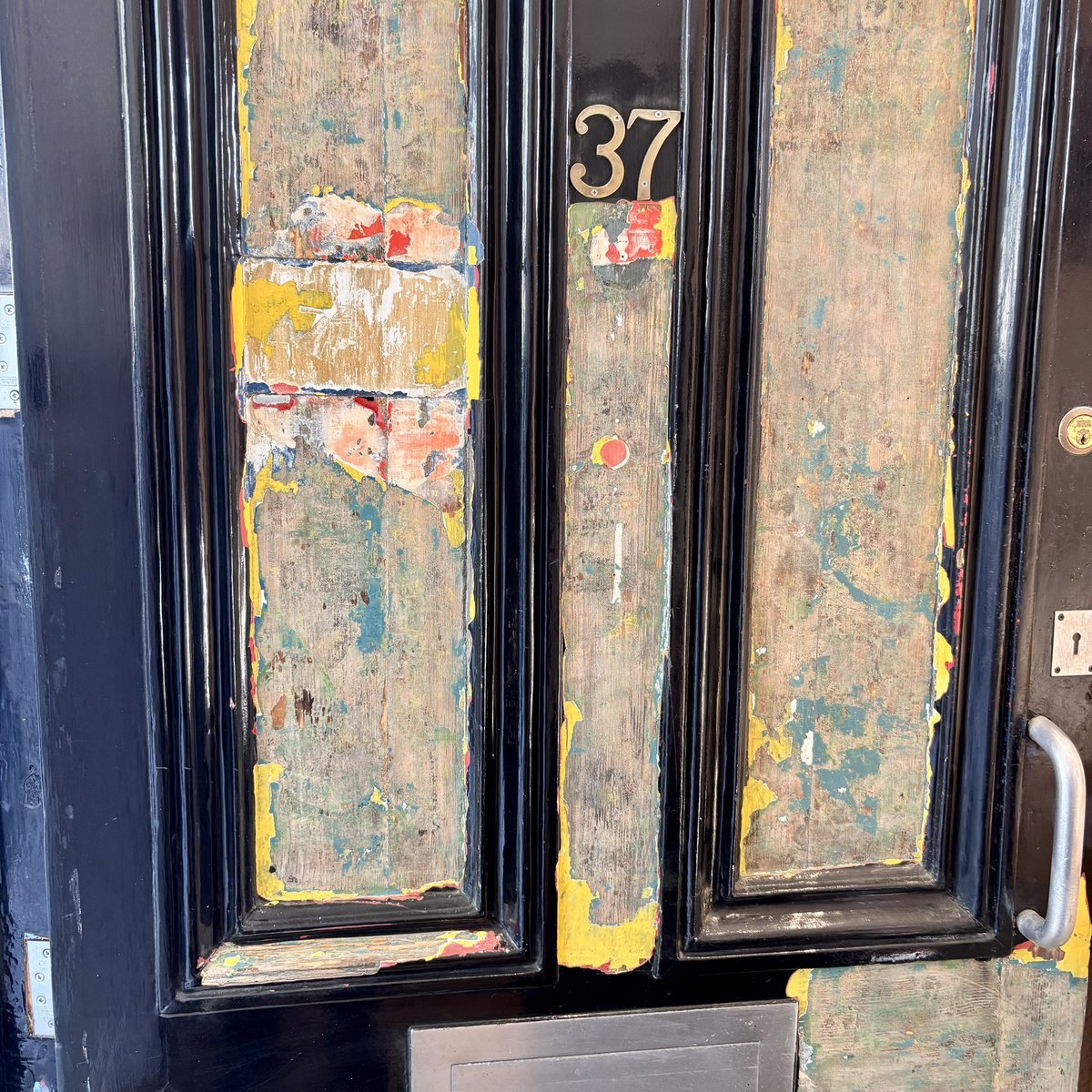 HantsWorkspace's tweet photo. Our front door is currently being refurbished. It will soon be its familiar black gloss colour but at the moment we can see traces of all the colours it’s been in the past, including red, turquoise and, would you believe, canary yellow! https://t.co/h15lQmaVMi
