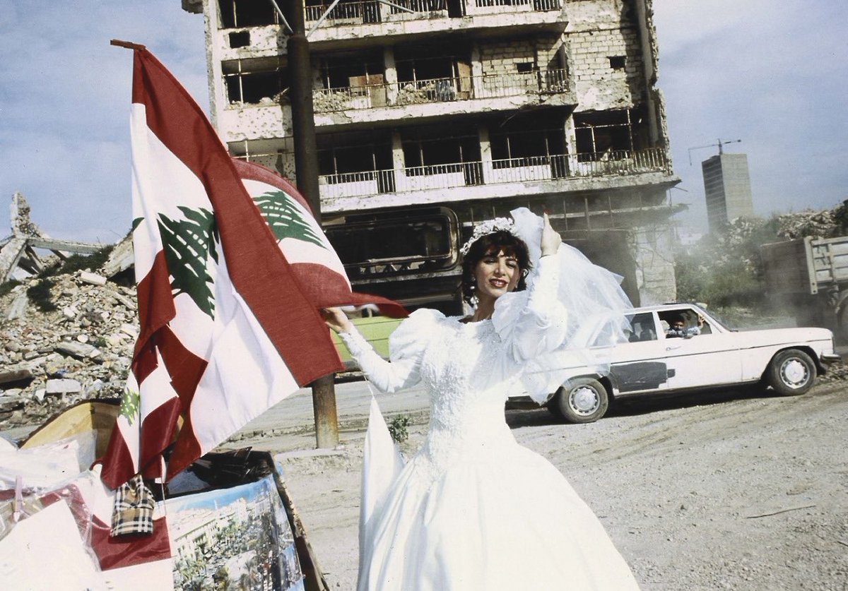 A Lebanese woman in West Beirut celebrates her wedding during the 1996 Lebanon War.