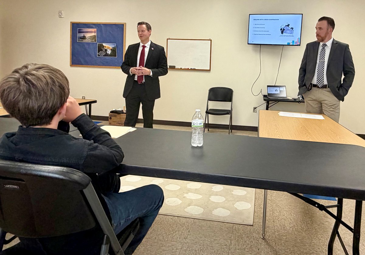 NCDOIFraud's tweet photo. Our Assistant Director Joshua Falls and Special Agent Bradley Kanupp helped middle school students prepare for a mock trial. They helped through the real-world side of criminal investigations and the justice system, offering practical insight and helping them get trial-ready. https://t.co/uahdUIuQe6