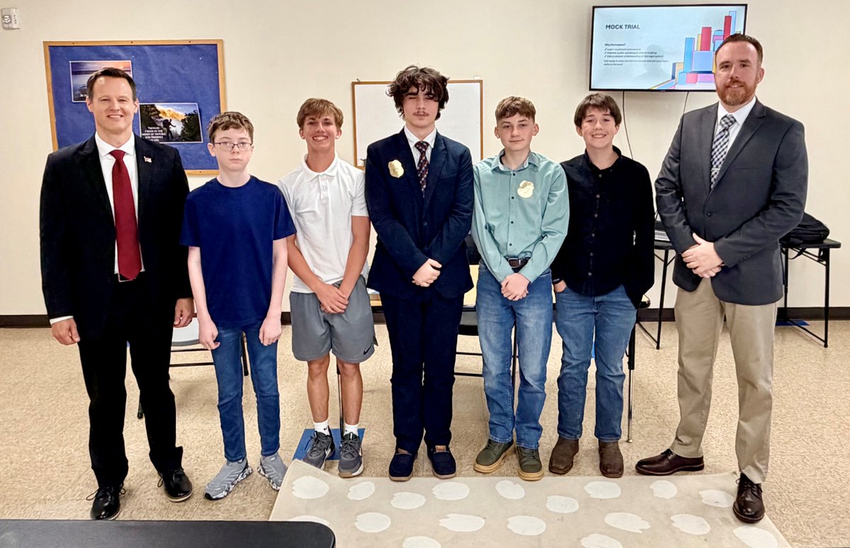 NCDOIFraud's tweet photo. Our Assistant Director Joshua Falls and Special Agent Bradley Kanupp helped middle school students prepare for a mock trial. They helped through the real-world side of criminal investigations and the justice system, offering practical insight and helping them get trial-ready. https://t.co/uahdUIuQe6