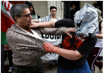 NEW: This was one of the moments that started the violence last night. "Bagman" was throwing himself on the ground in front of people trying to enter. He was also threatening to kill Jewish attendees of the event. He was one of the activists arrested &amp; I will have his ID after he