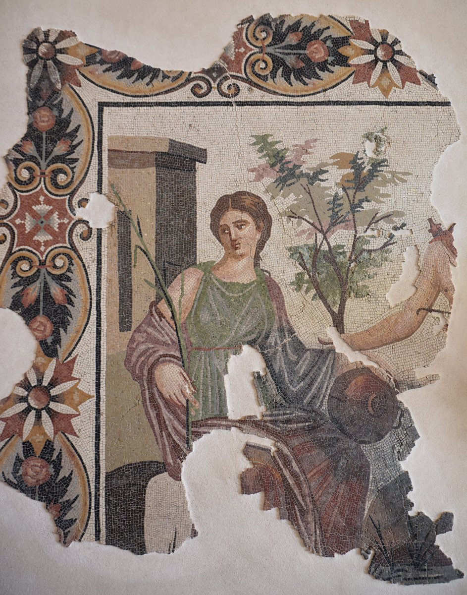 carolemadge's tweet photo. #MosaicMonday - Mosaic from Lambaesis in Numidia depicting Apollo and the nymph Cyrene. The nymph Cyrene, who was loved by Apollo, holds a flagon in her left hand (possibly signifying the sacred spring of Cyrene) and a reed in her right hand. To the right, only Apollo's bare arm is preserved, but he can be identified by the quiver on his shoulder. The mosaic dates to the 2nd or 3rd century AD.

Museum of Lambaesis, Algeria.