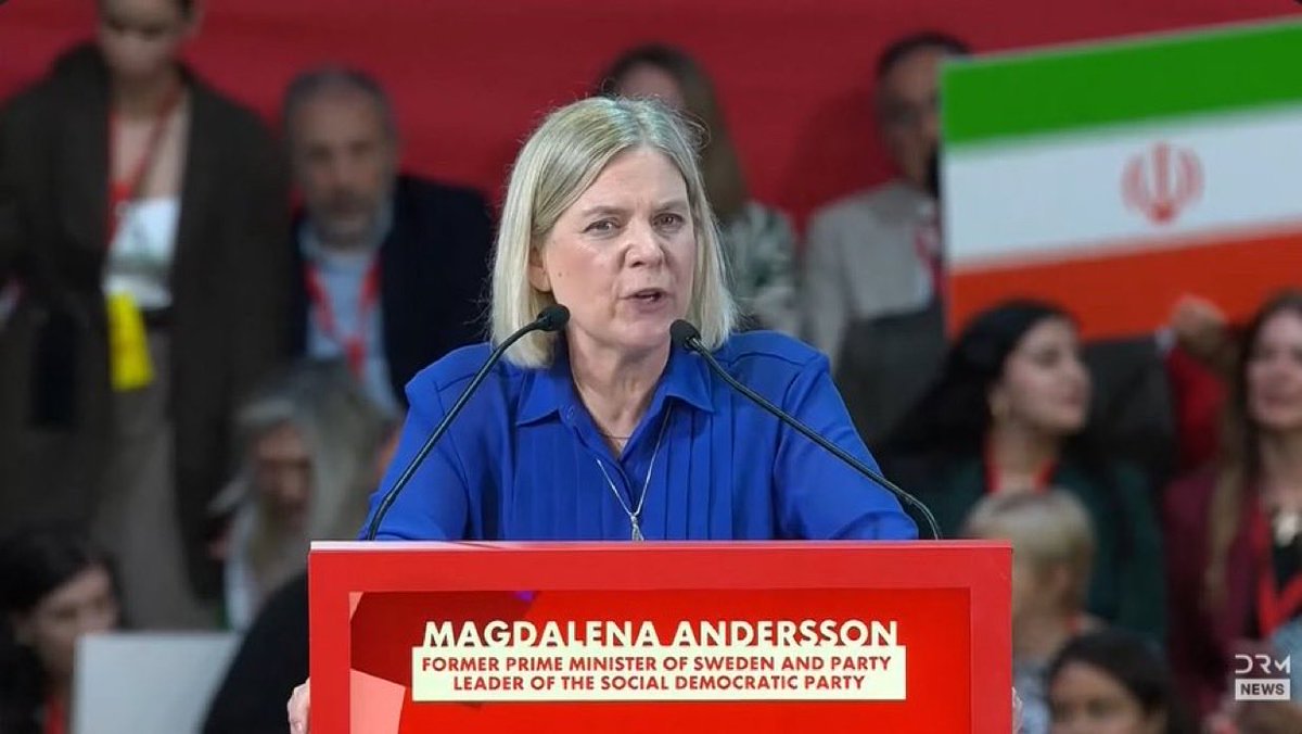 ardavank's tweet image. 🚨 SWEDISH SOCIAL DEMOCRATS’ IRAN PROBLEM

@magdandersson speaks about “defending #democracy” — while the Islamic Republic of #Iran’s flag is waved behind her at a rally in Barcelona.

The same regime that:
– executes protesters
– crushes dissent
– massacres its own people

This
