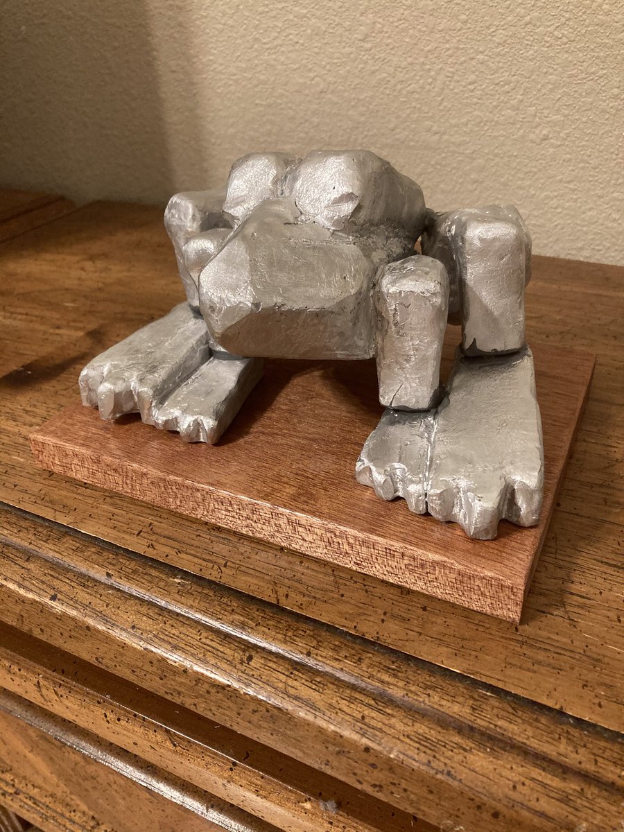 TsukiSheep's tweet image. This is an aluminum frog I made back in 2022 for a 3D foundations class I took. It’s mean to celebrate some trying about yourself. This represents nostalgia for Flipnote studio and video game memories. #art #trophy #3d #artwork