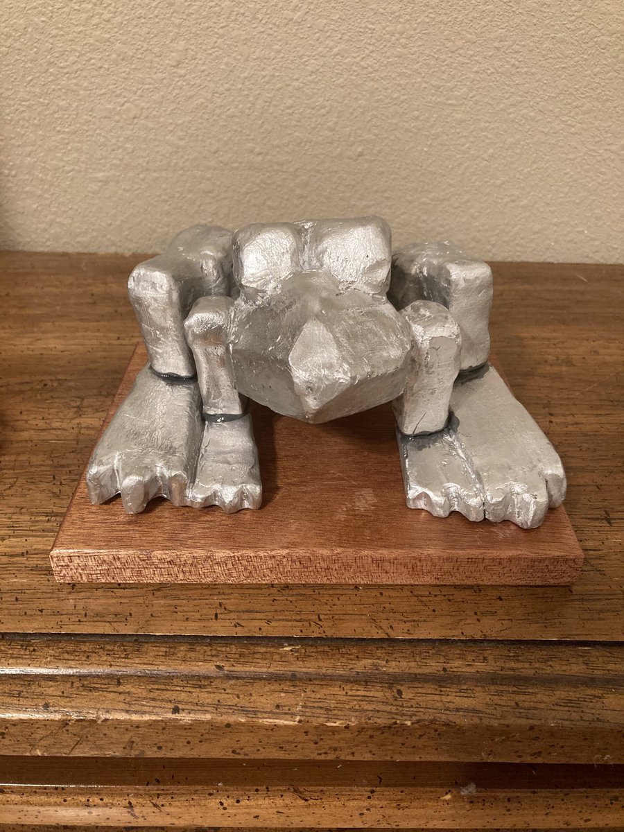 TsukiSheep's tweet image. This is an aluminum frog I made back in 2022 for a 3D foundations class I took. It’s mean to celebrate some trying about yourself. This represents nostalgia for Flipnote studio and video game memories. #art #trophy #3d #artwork