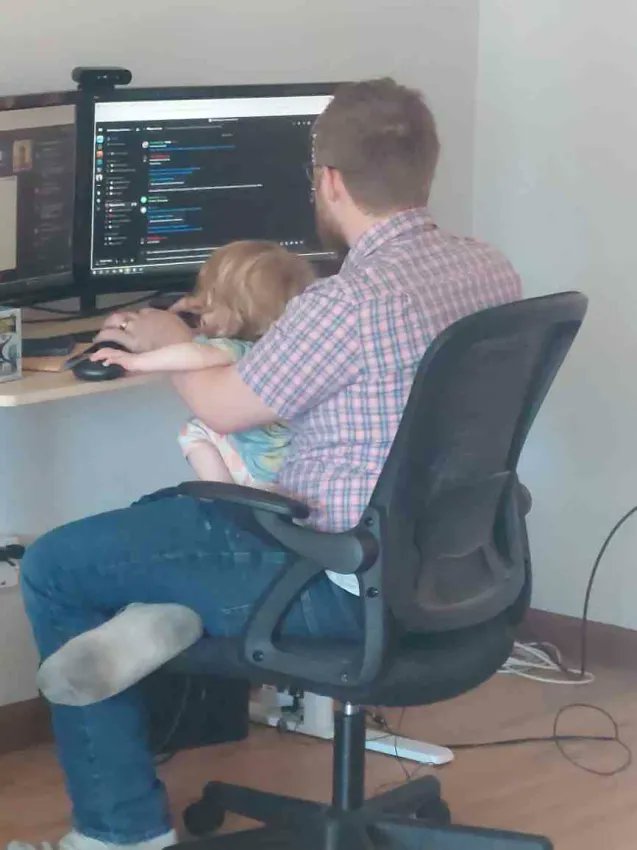 PaladinPure's tweet photo. Sometimes the kiddo wants to see what's going on in a meeting. I personally don't mind. Honestly, it's a huge win in life when your kid can sit with you while you work. https://t.co/tYrasyamwx