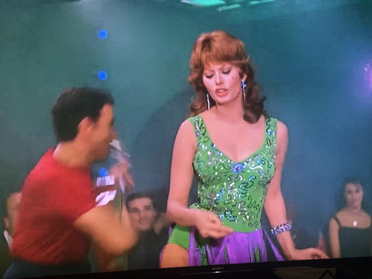 FrankTracy's tweet image. Trying to figure out the guitar chord fingering to this song, but this annoying Loren person keeps blocking my view. #TCMParty #ItHappenedInNaples