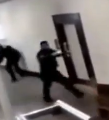SeedyEyes's tweet photo. @bennyjohnson This guy in the center morphs 3 directions. 1. Facing the direction the subject went. 2. Seems to be covering his back. 3. The kind of facing the wall where the officer who had his gun first was. https://t.co/F3jBB77n9F