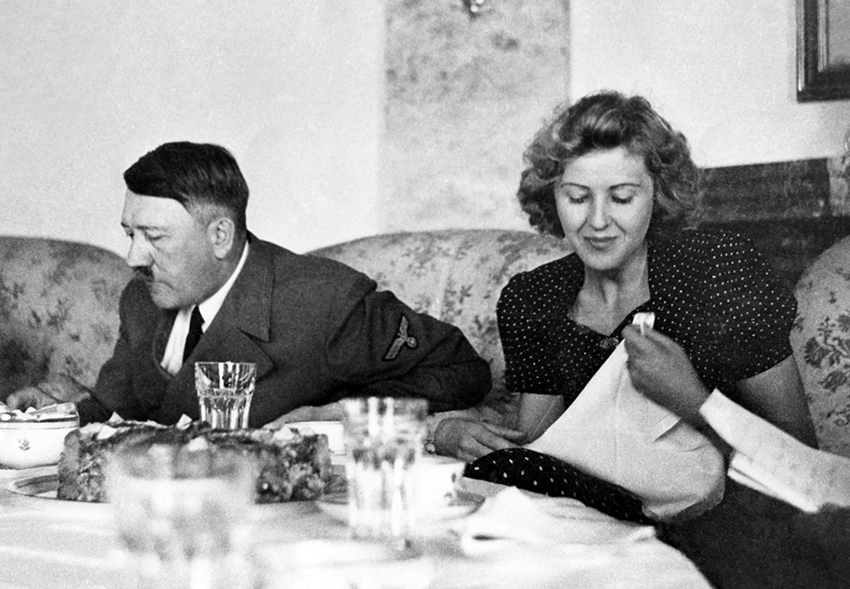 WWIIpix's tweet image. This night in 1945, Adolf Hitler married Eva Braun in a small civil ceremony in the Führerbunker in Berlin. After a modest wedding breakfast, Hitler and his secretary Traudl Junge dictated his last will and testament. 

The marriage would not last long. #WW2