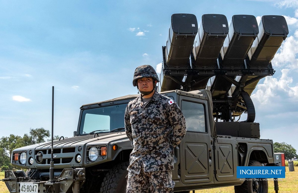 JAPANESE FIRE POWER LOOK: Japan Air Self-Defense Force personnel stand ...