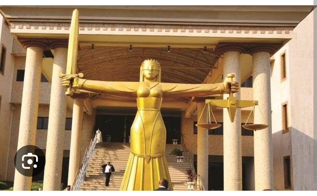 NTANewsNow's tweet photo. FG FILES TREASON  CHARGE AGAINST ALLEGED COUP PLOTTERS

The Federal  Government has filed a 13-count charge before the Federal High Court, Abuja against a retired Major General, a retired Naval Captain, a serving police inspector, and three others over an alleged coup plot and acts of terrorism.

The alleged coup plotters, are scheduled to be arraigned on  April 22, before Justice Joyce Abdulmalik of the Federal High Court, Abuja.

Those named in the charge are Major General Mohammed Ibrahim Gana, Captain Erasmus Ochegobia Victor,   Inspector Ahmed Ibrahim, Zekeri Umoru, Bukar Kashim Goni, and Abdulkadir Sani.

Also listed as a defendant, but said to be at large, is former Bayelsa State Governor, Timipre Sylva.

The charge, filed by the Office of the Attorney-General of the Federation and signed by the Director of Public Prosecutions of the Federation, Rotimi Oyedepo, SAN, accuses the defendants of offences ranging from treason and terrorism to failure to disclose security intelligence and money laundering linked to terrorism financing.

At the centre of the case is an allegation that the defendants conspired in 2025 to undermine the Nigerian state.

The defendants allegedly 
 “conspired with one another to levy war against the state to overthrow the President of the Federal Republic of Nigeria,” an offence punishable under Section 37 subsection 2 of the Criminal Code.

The prosecution further alleged that the defendants had prior knowledge of a planned treasonable act involving one Colonel Mohammed Alhassan Ma’aji and others but failed to alert authorities.

Beyond treason, the Federal Government is prosecuting the defendants for terrorism-related offences under the Terrorism Prevention and Prohibition Act, 2022.