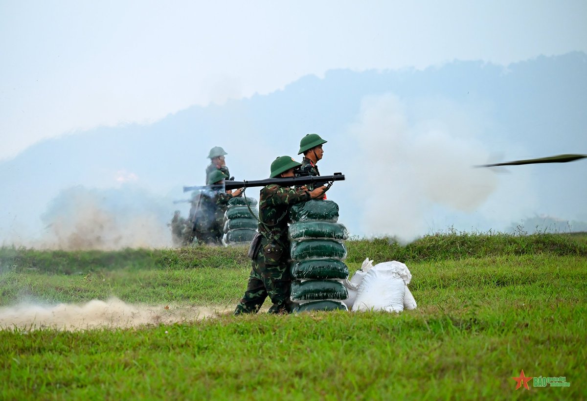 Back blast and smoking muzzle.