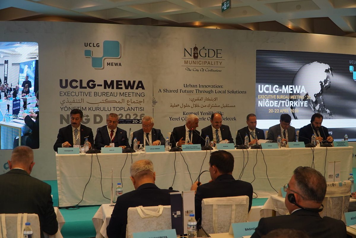UCLGMEWAorg's tweet photo. 🔵⚪️UCLG-MEWA Executive Bureau 2026, Niğde |Executive Bureau Meeting 

The meeting brought together members to review ongoing activities, assess governance and committee work, and exchange views on the organization’s priorities for the coming period. 

Discussions focused on strengthening institutional capacity, enhancing regional cooperation, and advancing key initiatives, alongside consultations on membership matters and new thematic working groups. 

The meeting also provided a platform to align on future plans and reinforce a shared vision for more effective, collaborative, and forward-looking local governance across the MEWA region.

جتماع المكتب التنفيذي لمنظمة UCLG-MEWA لعام 2026، نيدة | 

جمع اجتماع المكتب التنفيذي الأعضاء لمراجعة الأنشطة الجارية، وتقييم الحوكمة وعمل اللجان، وتبادل الآراء حول أولويات المنظمة للفترة القادمة. تركز المناقشات على تعزيز القدرات المؤسسية، ودعم التعاون الإقليمي، ودفع المبادرات الرئيسية، إلى جانب إجراء مشاورات حول شؤون العضوية مجموعات العمل المواضيعية الجديدة. كما يوفر الاجتماع منصة للتنسيق بشأن الخطط المستقبلية وتعزيز الرؤية المشتركة من أجل حوكمة محلية أكثر فعالية وتعاوناً وتطلعية في جميع أنحاء منطقة MEWA.

🔵⚪️UCLG-MEWA Yönetim Kurulu 2026, Niğde | Yönetim Kurulu Toplantısı 

Toplantı, paydaşları devam eden faaliyetleri gözden geçirmek, yönetişim ve komite çalışmalarını değerlendirmek ve teşkilatın önümüzdeki dönem için öncelikleri hakkında görüş alışverişinde bulunmak üzere bir araya getirdi. 

Kurumsal kapasitenin güçlendirilmesi, bölgesel iş birliğinin artırılması ve önemli girişimlerin ilerletilmesinin yanı sıra üyelik konuları ve yeni tematik çalışma grupları hakkında istişarelere odaklanan toplantı, ayrıca, ilerleyen dönemdeki planlar üzerinde mutabakat sağlamak ve MEWA bölgesinde daha etkili, işbirlikçi ve ileriye dönük yerel yönetişim için ortak vizyonu güçlendirmek için önemli bir platform sağladı.