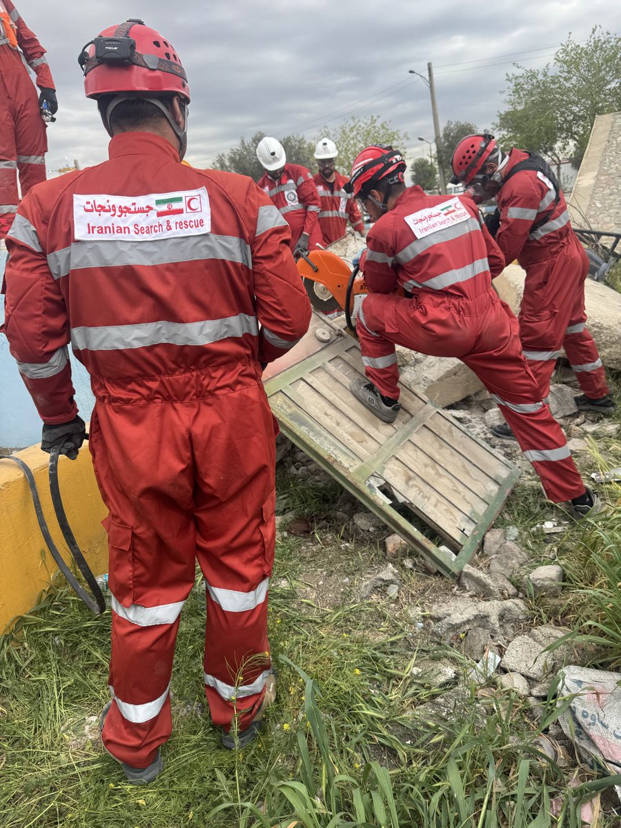 Xcastel's tweet photo. Four minutes after a strike hit a residential complex, @Iran_RCS rescue teams were already on site, pulling people from the rubble.

But the fate of Alireza Sohbatloo in Zanjan was tragically different. While conducting a search-and-rescue operation to save someone trapped beneath the debris, a second strike hit the same location, just 10 minutes after the first.

Alireza was 34 years old and had served as a volunteer with the Iranian Red Crescent Society for 15 years. He was killed while carrying out his humanitarian duty.

His story deeply touched me. No humanitarian worker and no civilian should tragically end as Alireza. Attacks on those who serve humanity are unacceptable. All parties to conflict must make every effort to always respect international humanitarian law, at all times.

My visit to Iran, together with my colleagues from @ifrc , allowed me to witness firsthand the extraordinary commitment of Iranian Red Crescent staff and volunteers across the country during 40 days of international conflict. Their courage and dedication are nothing short of remarkable.
