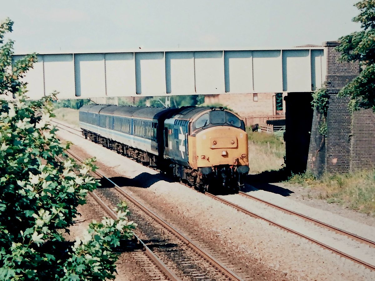 Invermuir's tweet image. 37408 heads towards Crewe with the 9.13 from Bangor. 24th June 1994. ##tmrguk #class37 #tractors @TheGrowlerGroup