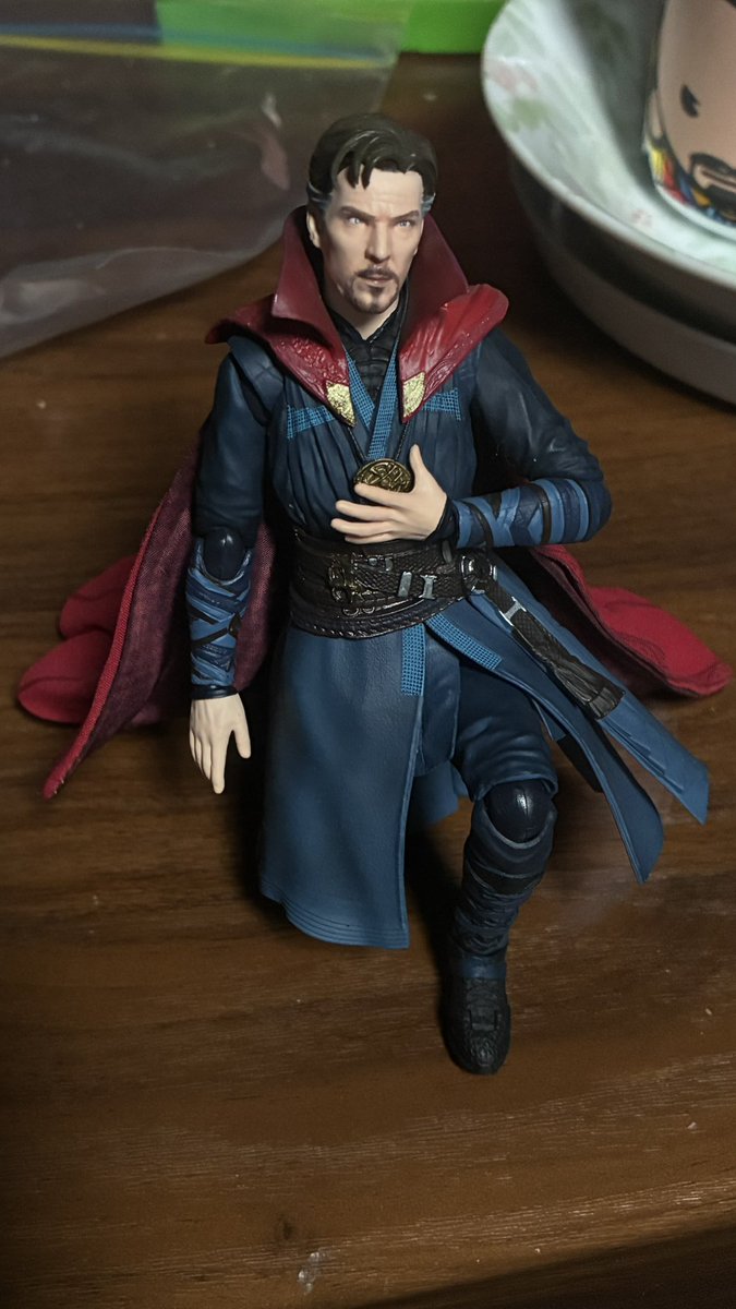 featvitan's tweet image. his toes are posable , the eye of agamotto is removable but not his cloak , the cloak is NOT removable ☹️ the gooning face is actually really cute i cant see it as a gooning face anymore ,,,,,,,, anyway i will #not be keeping him in my bag unless i start that itabag