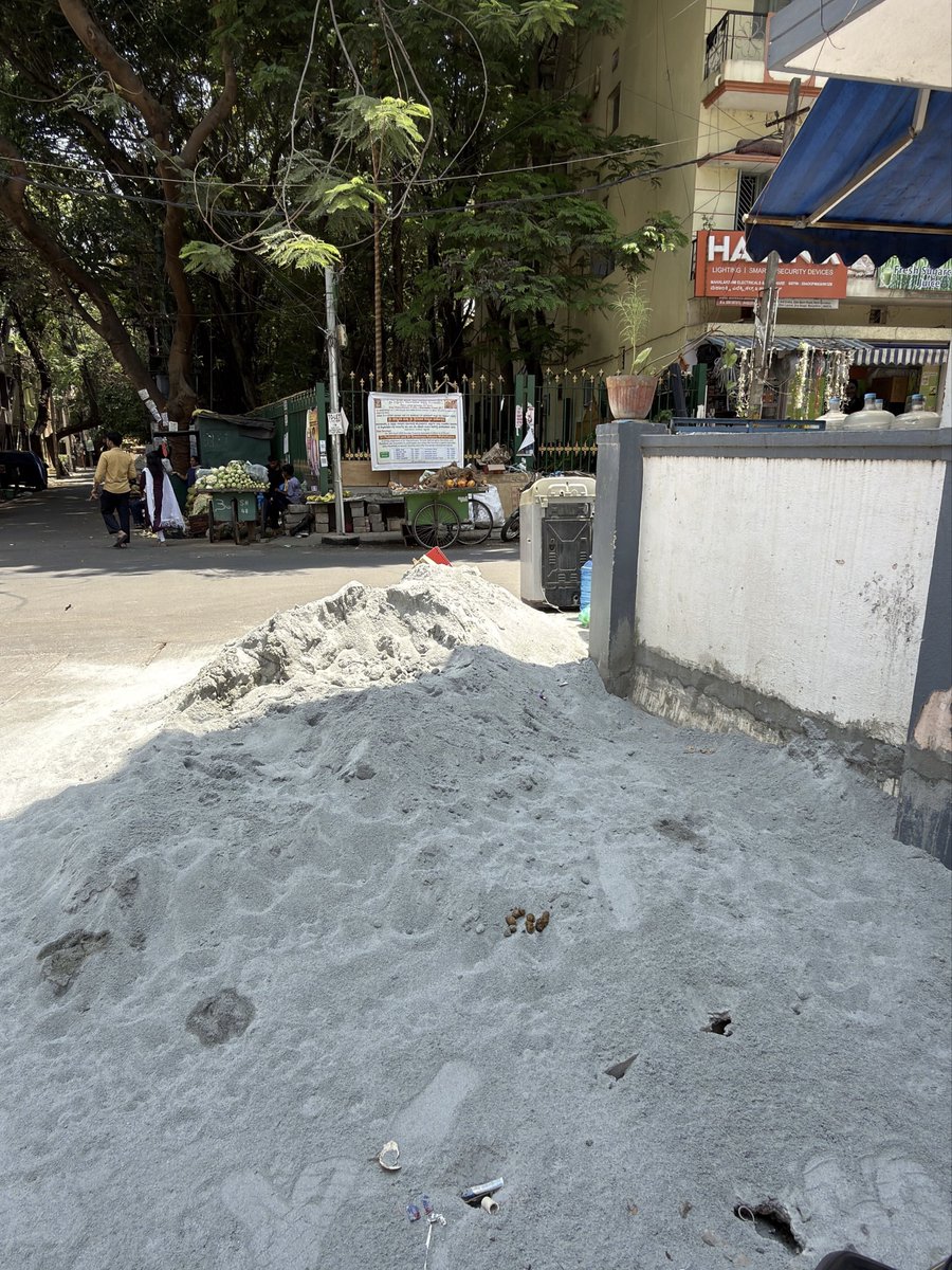 kaush394's tweet photo. Dumping cement in front of my house by BBMP without notice, right over parked bikes, blocking my gate and access. It’s been 4 days and the area is getting worse daily.

Tried raising a complaint on https://t.co/ujtLqgwP50 but the site isn’t working. (Attached photo)

Request immediate action to clear this and restore the area.

Location: Ward 176, BTM 2nd stage
Latitude - 12.9140131
Longitude - 77.6138842
@bbmpcommr @bbmp_official @GBA_office 

#BBMP #NammaBengaluru #Bangalore #CivicIssues