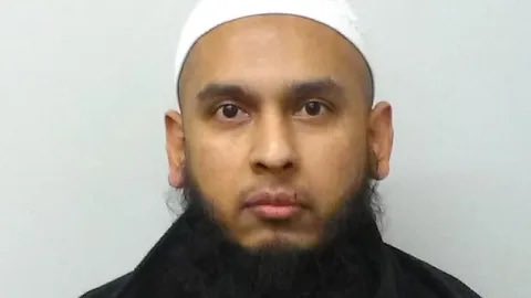 London Stock Exchange bomb plotter was allowed to stay in UK! 

A terrorist denied asylum was granted leave to remain in Britain on human rights grounds, a court ruling reveals.

Shah Rahman, a convicted terrorist who was jailed for threatening to blow up the London Stock
