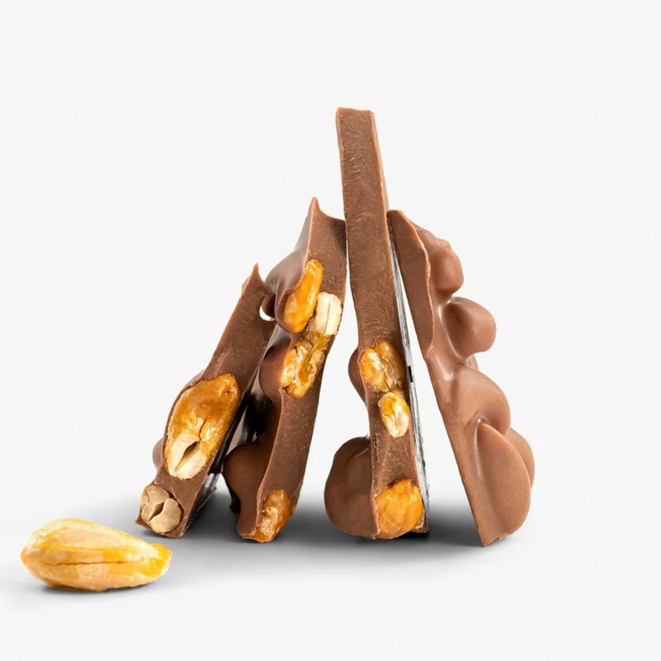 TheNibble's tweet image. It’s National Chocolate Covered Cashews Day. You can dip your own with this #recipe t.ly/0AHZk, or purchase delicious #chocolate bark of caramelized cashews covered with cashew milk chocolate. From Swiss chocolatier Läderach. #Vegan @laderach_na