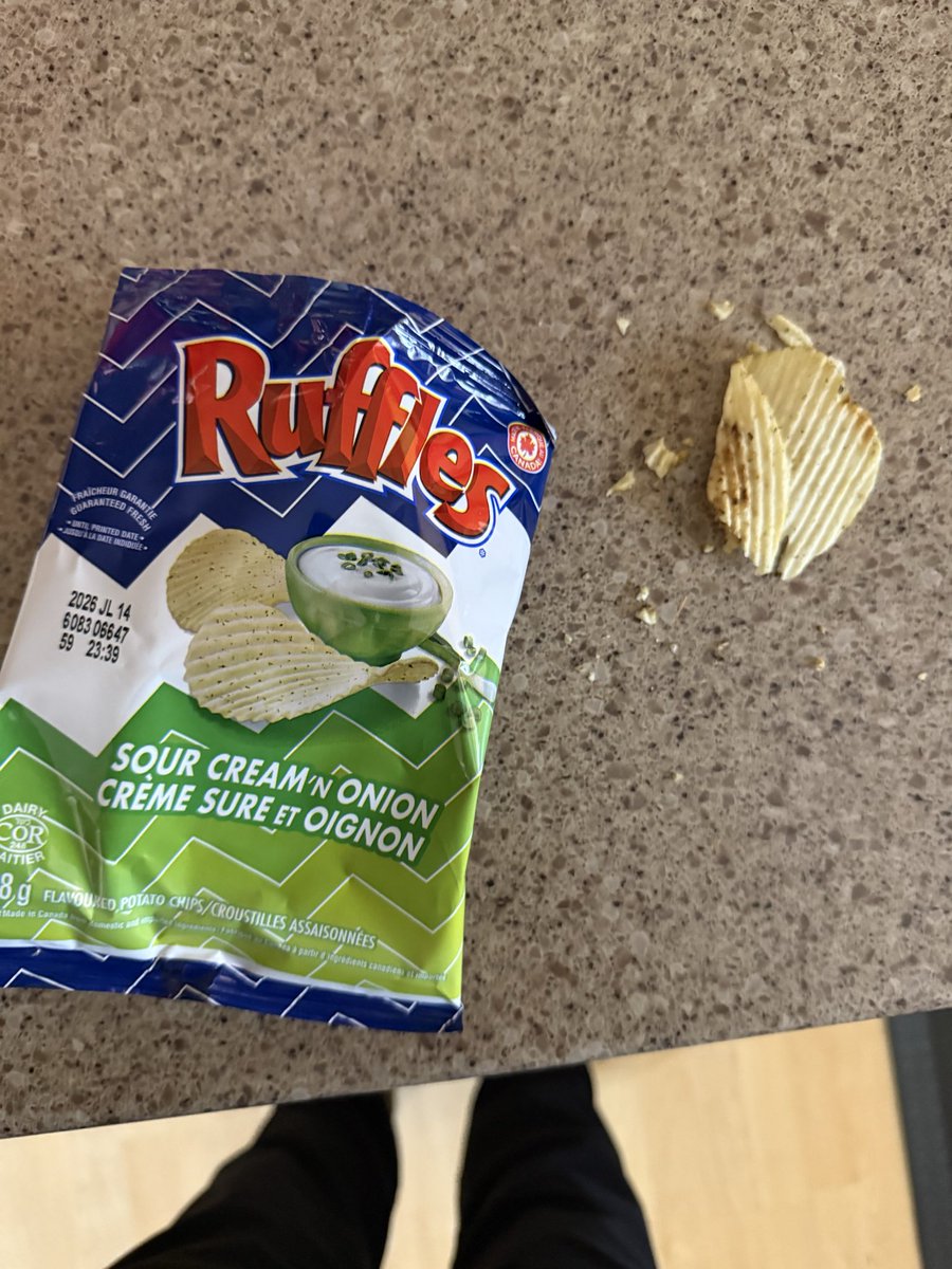 AngryTorontoFan's tweet photo. @RUFFLES is this a joke. Noticed a particularly flat bag of chips in the Favourites box. This would be funny if it weren’t so ridiculous. One chip and crumbs https://t.co/xGxocYUUlC