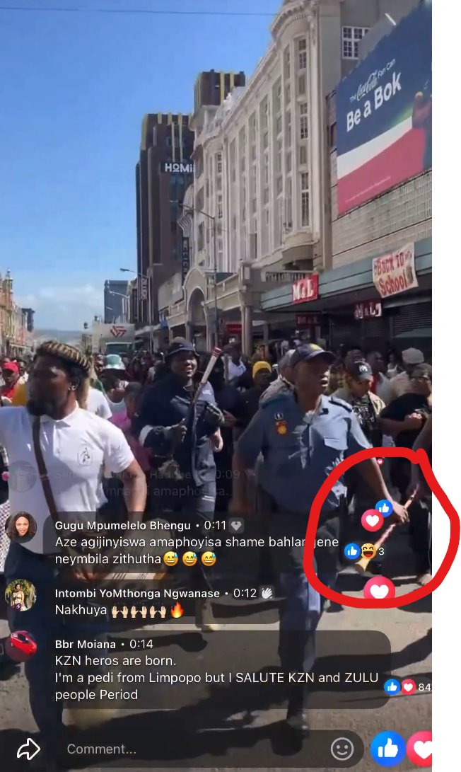 GarryCluskey's tweet photo. @FutureBite Hang on!...is this our SAPS running along with protesters and a stick?...or what is it? https://t.co/q3sfauVb9m