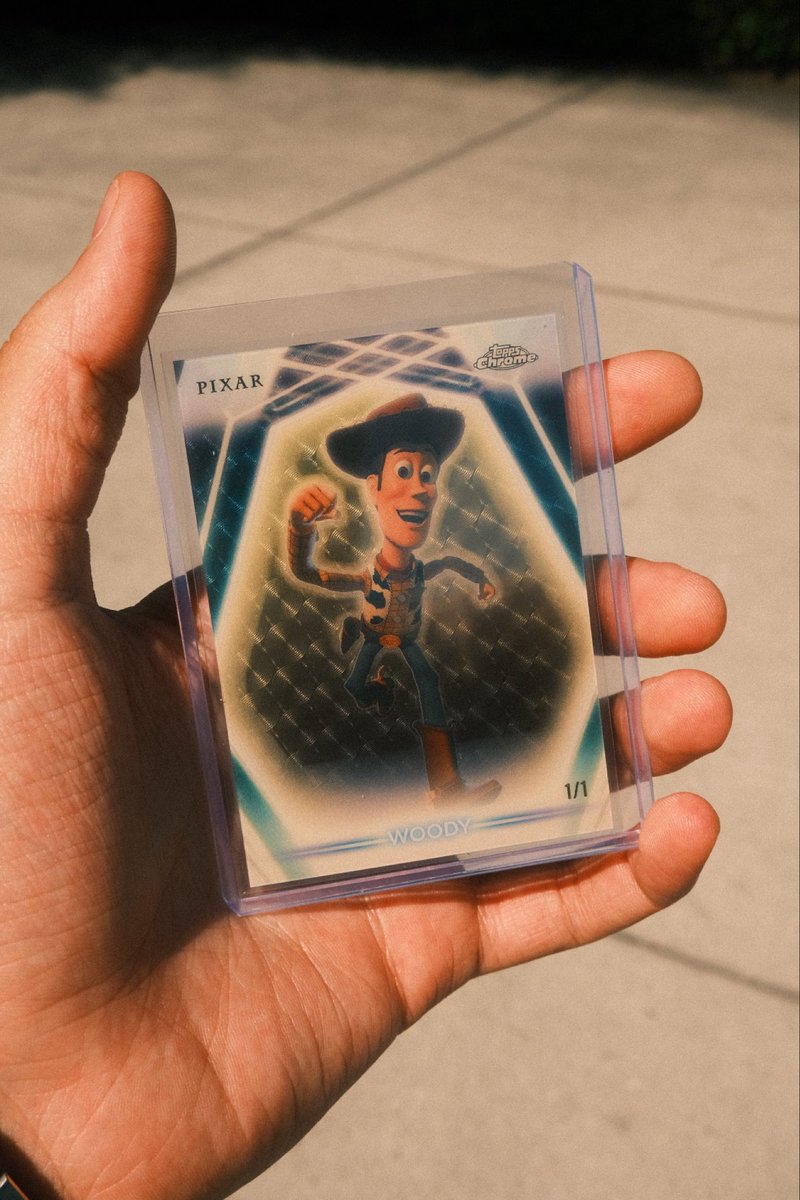 DickandJanes's tweet photo. A gentleman purchased a box of the all new Topps Disney Neon set and happened to pull the  1 of 1 Woody &amp; an Auto Goofy!

What a day at the office! https://t.co/UuQBwfWB9O