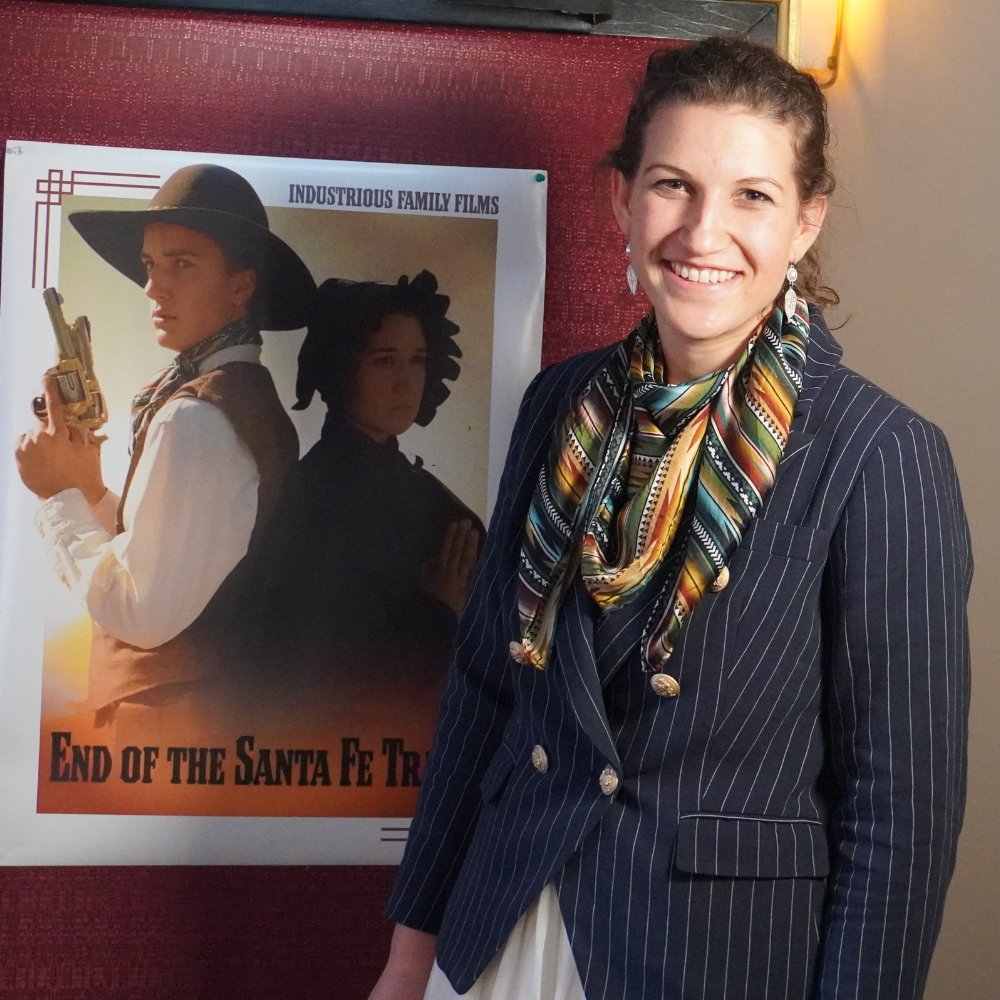 Director <a href="/Faustina_Bowen/">Faustina Bowen</a> poses in front of a poster at the #EndoftheSantaFeTrail premiere. 

Unlock full access to see the film on #IndustriousFamilyTheater now!

industriousfamily.com/streaming