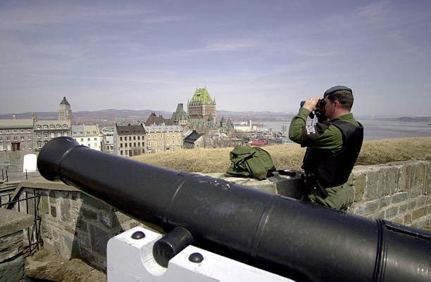 25YearsAgoLive's tweet photo. The riots are over the ongoing Summit of the Americas in Quebec. Here are some other dramatic pictures: https://t.co/LuKTzpTvCs