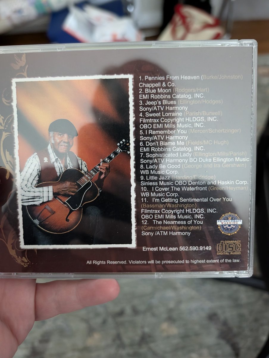 dizchris's tweet photo. Anybody remember Ernest McLean? He used to play blues guitar by the court of Angels in New Orleans square at Disneyland. Bought this CD years ago at what is now the Pandora store. I miss when Disney used to sell the music of park performers. https://t.co/MHBLBoVUhw