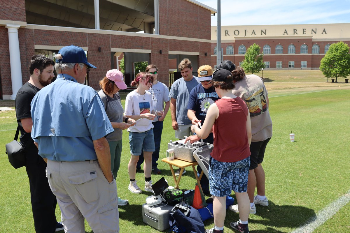 GeospatialTroy's tweet photo. Mr. Allenback, the UAS Program director, is teaching UAS 2212 Piloting Familiarization. The class was  week flying drones  last week. Mr. Allenback reports that 5 of the students have earned their FAA Part 105 Pilot License since the class began.  Looked like fun! https://t.co/usmgNEFXjV