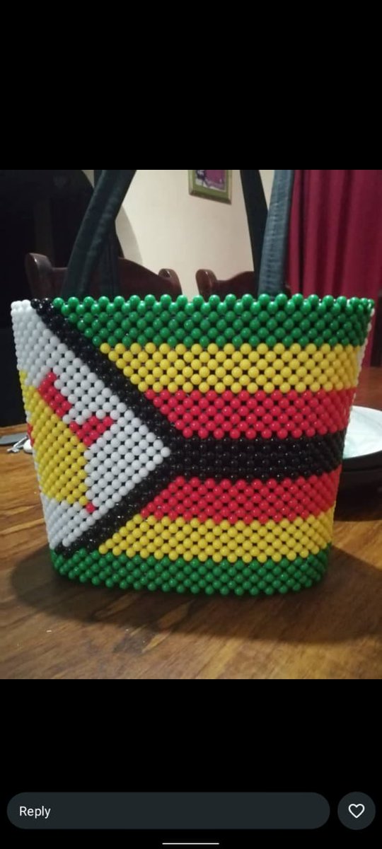 Bernadette1751's tweet image. The latest showcase in local arts features a beaded bag adorned with the Zimbabwe flag, demonstrating innovative craftsmanship that merges traditional weaving with modern accessory design.
#LocalArt