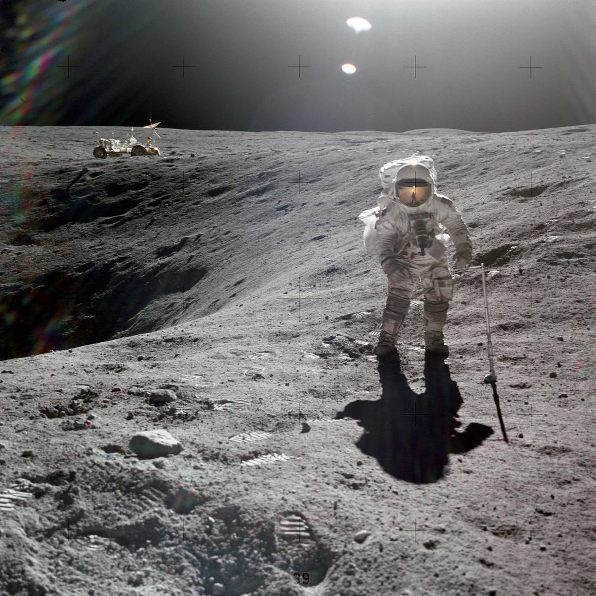 TheRiddlerMan's tweet image. The #Apollo 16 lunar module, named #Orion, touched down on the #Moon on this day in 1972. 

With the help of the Lunar Roving Vehicle, seen on the far side of Plum crater in this photo, John Young and Charlie Duke (shown here) drove 16.6 miles (26.7 km) in the Moon's Descartes