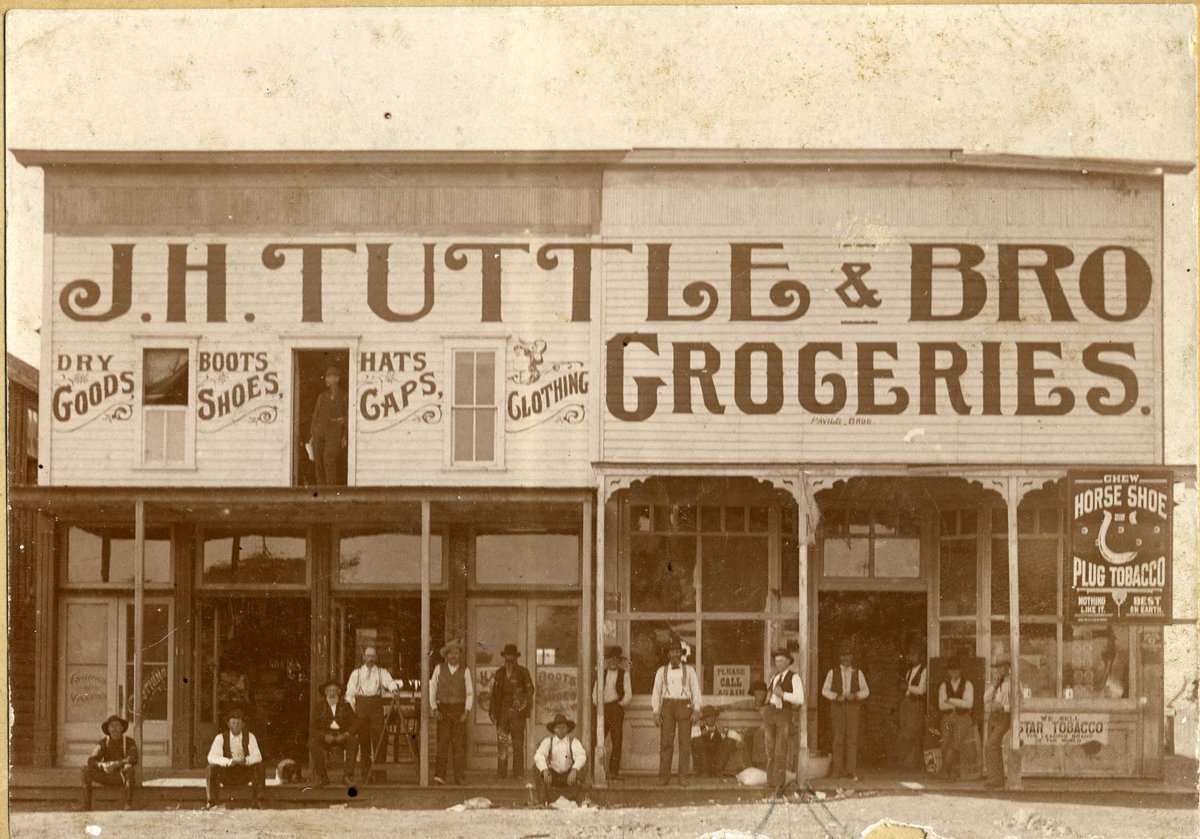 okhistory's tweet photo. This photo from May 1895 shows the exterior of J. H. Tuttle & Bro in Minco, Indian Territory. The building advertises dry goods, boots, shoes, hats, caps, clothing, and groceries.
(23196.46, Meta Chestnutt Sager Collection, OHS)
#Minco #IndianTerritory https://t.co/k0ArgLpaf5