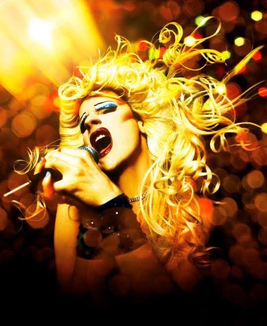TheRealMickRock's tweet photo. Happy Birthday to Mick’s dear friend, the great John Cameron Mitchell!

JCM as Hedwig #ShotByRock in 2001 &amp; 2018 https://t.co/TGfhCE6efQ