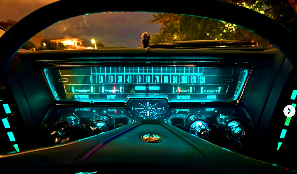 This is the dash in my 1963 Chrysler Imperial*, which doesn't use light bulbs.

Back in the early ’60s, Chrysler did something wild with their dashboards: they used electroluminescent (EL) lighting instead of bulbs.

Instead of shining light onto the gauges, the gauges themselves