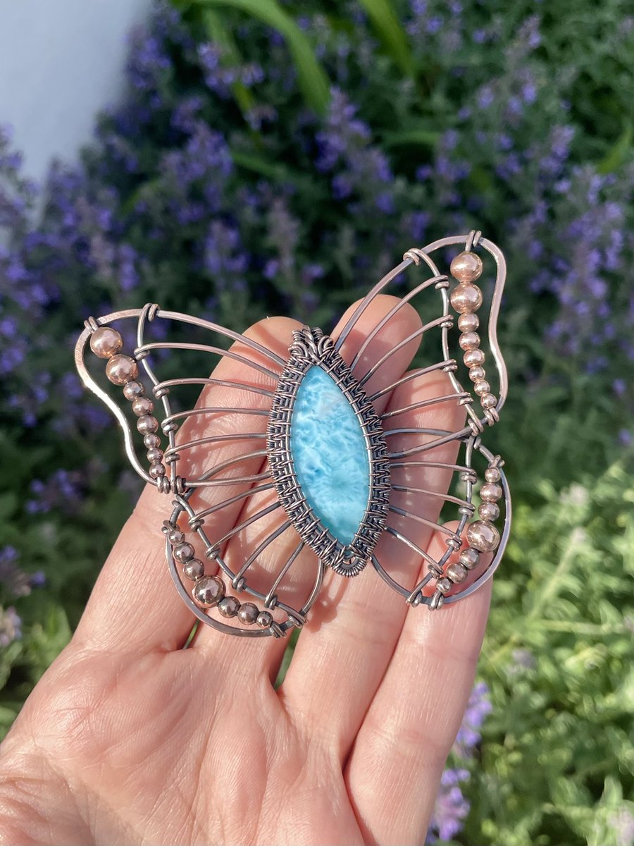 I don’t think I’ll ever get tired of making butterfly pendants in the spring. 🦋 This one is made with Larimar wrapped in copper wire! It will be part of this Friday’s shop update. 🩵