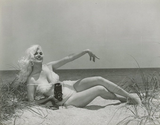 Noirchick1's tweet image. Beachside subject Bettie Page #BOTD and her photographer Bunny Yeager. Not only did Yeager capture Page in her most iconic images, but her own self-portraits are legendary as well.