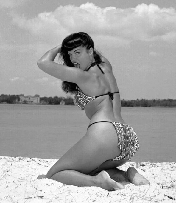Noirchick1's tweet image. Beachside subject Bettie Page #BOTD and her photographer Bunny Yeager. Not only did Yeager capture Page in her most iconic images, but her own self-portraits are legendary as well.