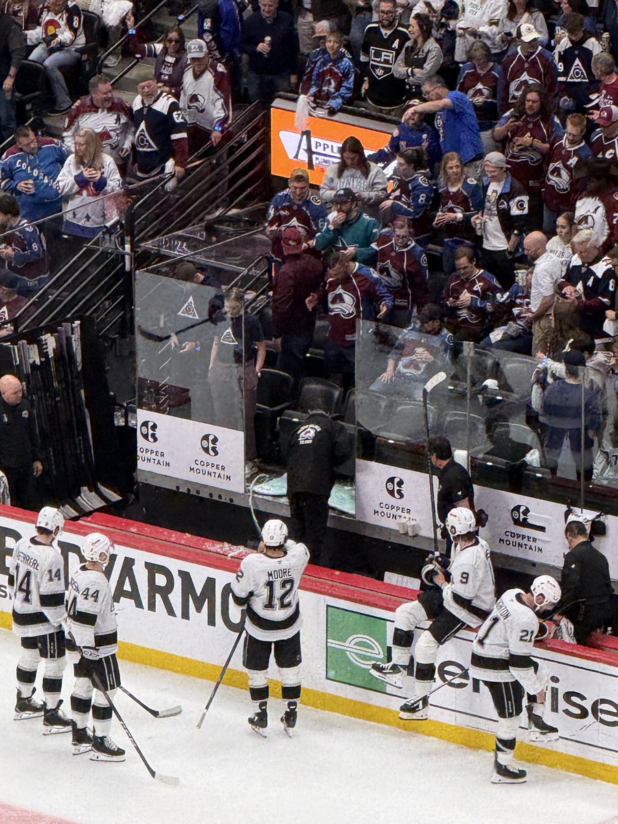 Fans were banging in the glass behind the Kings bench… and they broke a pane of glass