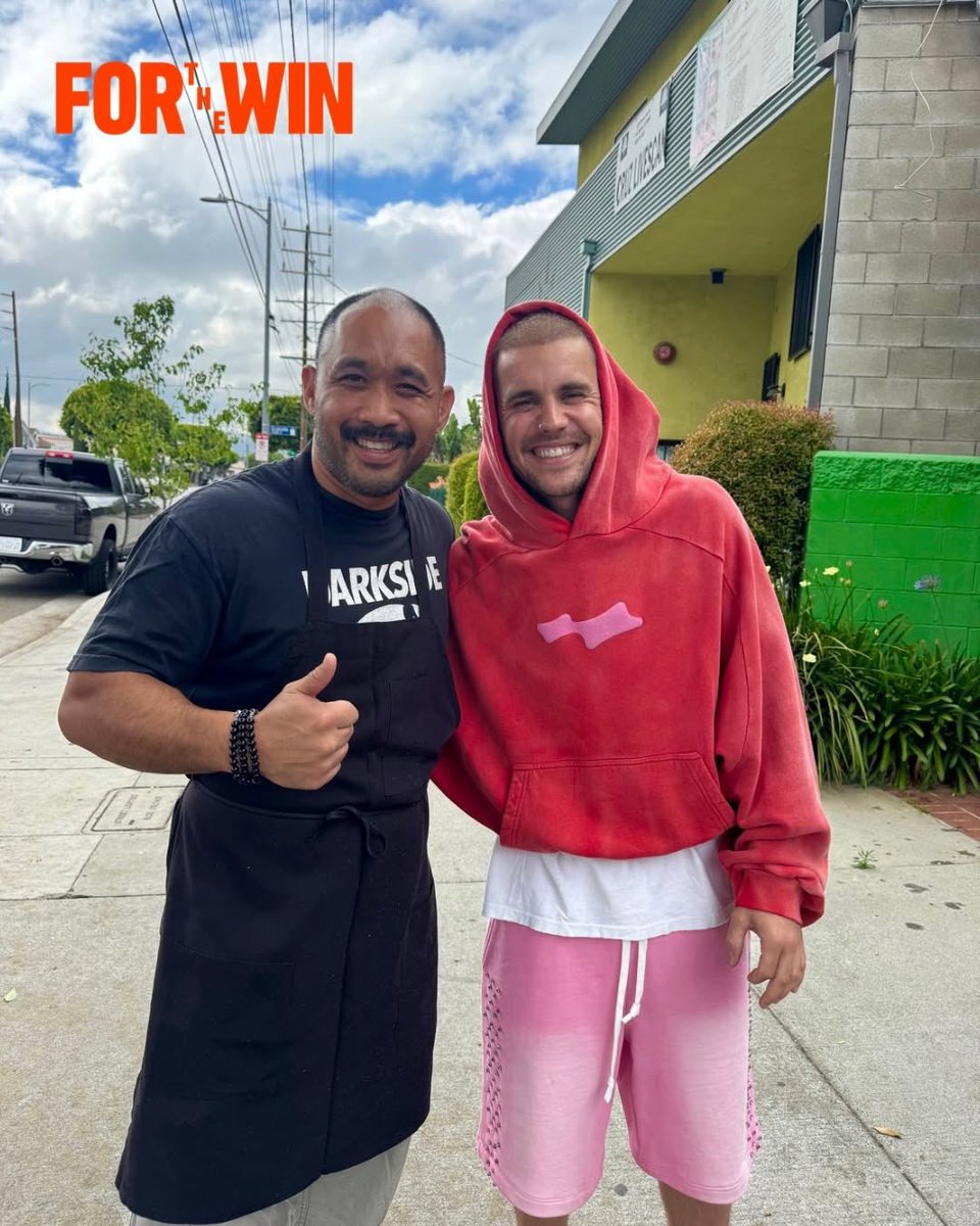 Photo of Justin Bieber with a fan in Los Angeles, California